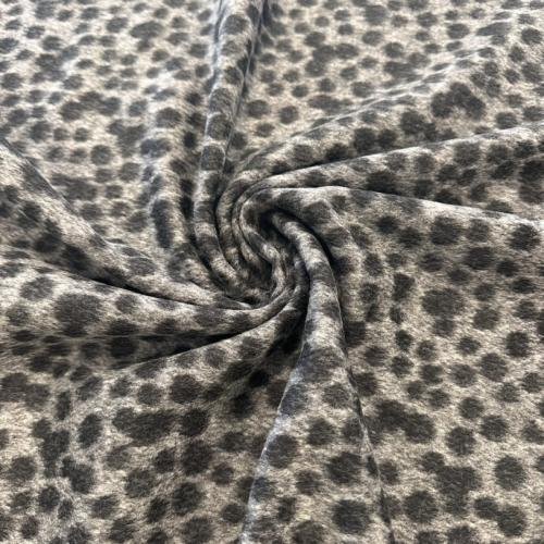 Leopardo rašto pusvilnės audinys su pūkeliu